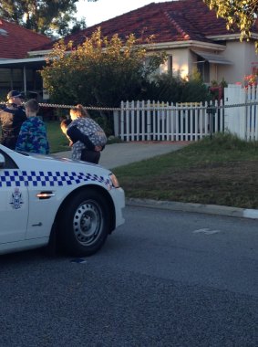 Police speak to neighbours in Mosman Park after the siege.