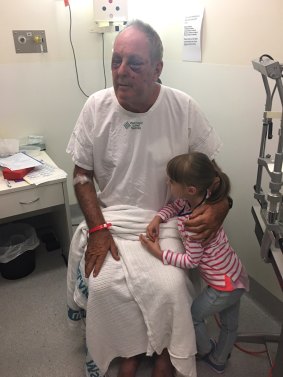 Kelvin Tennant at the Alfred hospital with his granddaughter Imogene. 