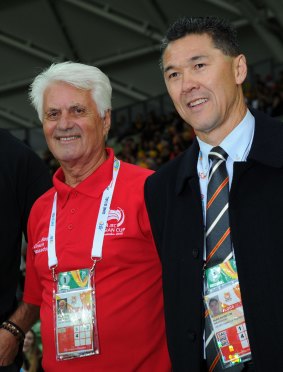 Davidson with former Socceroo Rale Rasic at the Asian Cup match between the Socceroos and Kuwait on January 9.