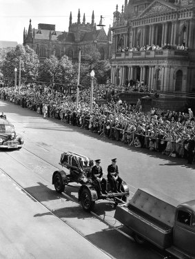 Thousands line George Street, Town Hall to see the procession.