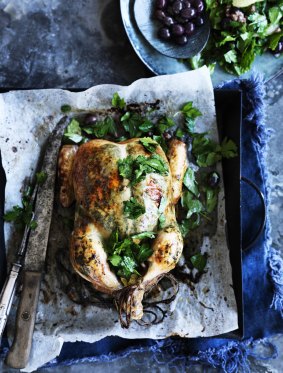 Roast tarragon Chicken with lemon caper and olive salad.