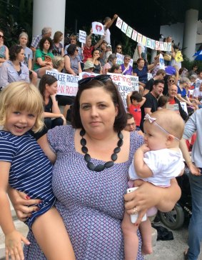 Kelly Daniels of Beenleigh, with her two children, was among the supporters showing solidarity with doctors' decision not to release a baby back to off-shore detention.
