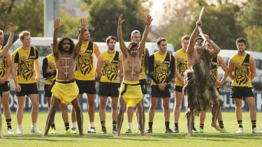 Members of Richmond's Korin Gamadji Institute perform a preview of the Tigers War Cry.