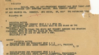 An Associated Press "A" wire copy edited for the teletypesetter circuit, reporting on the assignation of President John F. Kennedy in Dallas. 