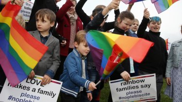 Families opposed to a plebiscite on same-sex marriage rally outside Parliament earlier this month.