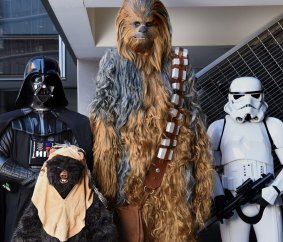 Sydney Star Wars fans (from left) Brenden Graves (Darth Vader), Keira Skidmore (Ewok),  Sarah Hillier (Chewbacca) and Craig Ellis (stormtrooper) experience life in a galaxy far, far away.