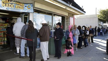 Customers wait in line to buy Powerball lottery tickets in Hawthorne, California.