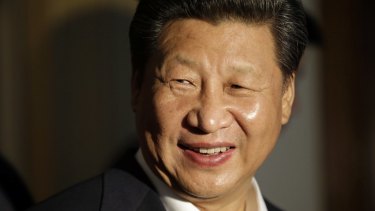 Chinese President Xi Jinping smiles as he concludes a visit to Lincoln High School in Tacoma, Washington, during his US visit.