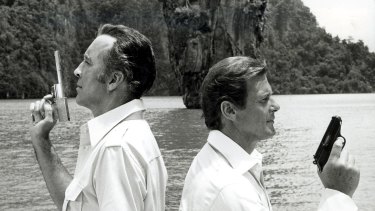 James Bond (Roger Moore, right) duels with Christopher Lee in <i>The Man with the Golden Gun</i> at Khao Phing-Kan island, Thailand.
