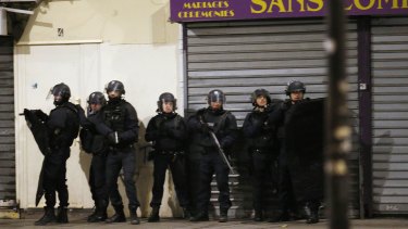 Police forces in Saint-Denis, where authorities told residents to stay inside.