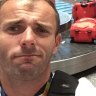 "Mine's the red one": Silver medallist Nick Dempsey sees the amusing side of the bag dramas. 
