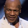 Iron Mike Tyson takes a tumble at the hands of his latest opponent - a hoverboard