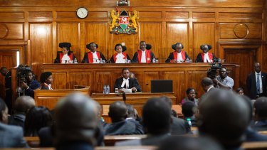 Kenyan Supreme Court judges deliver the verdict on a petition challenging the presidential election result on Friday.