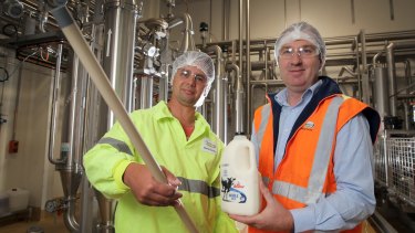 Fonterra Cobden production supervisor Brad Matin, holding one of the new microfiltration tubes, and production manager Brett Rowlands.