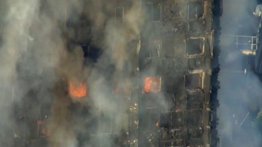 A massive fire raced through the 24-storey high-rise apartment building in west London early Wednesday, sending at least 30 people to hospitals, emergency officials said. 