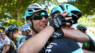 Stage winner Mark Cavendish, left, is congratulated by his Etixx-Quick Step teammate and set-up rider, Australian Mark Renshaw.