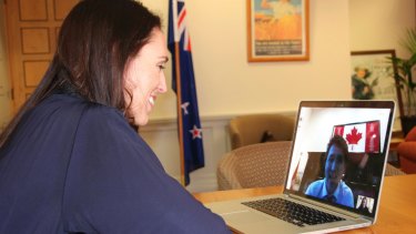 New Zealand Prime Minister-designate Jacinda Ardern takes a Skype call from Canadian PM Justin Trudeau in Wellington on Tuesday.
