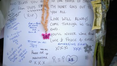 Tributes left in central Manchester on Tuesday.