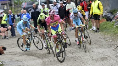 Tinkoff-Saxo's Alberto Contador leads his group up the dirt track of Colle delle Finestre during the penultimate stage of the Giro d'Italia on Saturday.