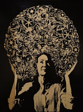 James Powditch's portrait features Cath Keenan wearing what appears to be an afro filled with cogs and the words of children at the Sydney Story Factory.