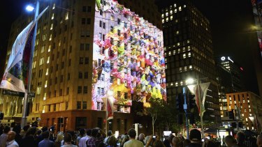 Images were projected onto the Lindt Cafe building during the one year service.