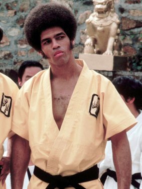Jim Kelly - and sideburns - in a scene from Enter the Dragon.
