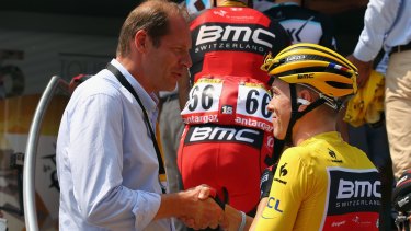 Tour de France race director Christian Prudhomme with Rohan Dennis before the start of stage two in Utrecht.