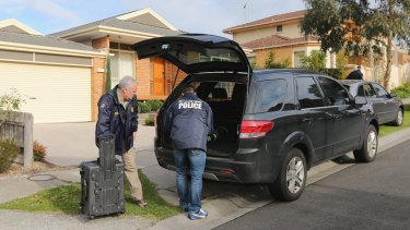 Australian Federal Police conduct a raid on a house in Vermont South on Thursday. 