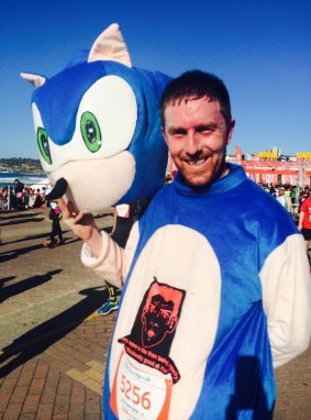 A hot day's work: Andrew Birdsall, 31, from Haberfield, who ran in his Sonic the Hedgehog costume.