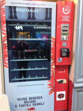 The 24-hour meat vending machine outside the "l'ami Txulette" butcher shop in Paris just before it was stocked and open for business.