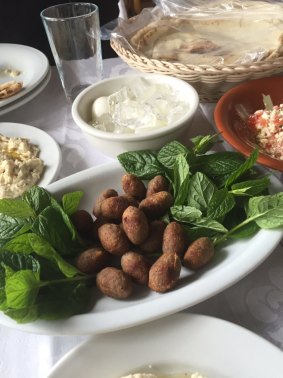 Kibbeh is traditionally  made of ground lamb mixed with spices and burghul cracked wheat.