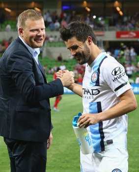 Adelaide United coach Josep Gombau shakes hands with David Villa after the game between United and Melbourne City.