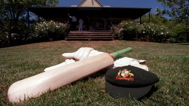 A cricket bat and cap at the launch of the Australian Cricket Bat Willow Project.