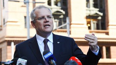 Scott Morrison says banks that hide behind the new rules to charge more for loans "have to face their customers".