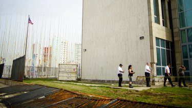 Personnel of the American Embassy in Havana inspect the damage caused by Hurricane Irma's powerful waves and storm surge to the embassy property. 