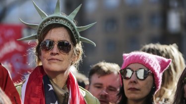A demonstrator wears a Statue of Liberty crown at the Women's March on New York last weekend.