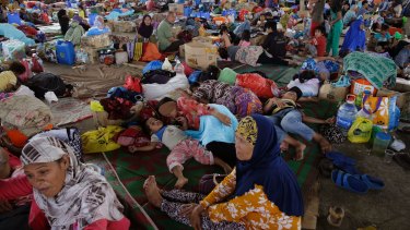 Evacuees stay at a crowded evacuation centre on the outskirts of Marawi city, southern Philippines. 
