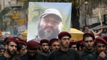 Hezbollah militants carry the coffin of slain commander Imad Mughniyah through the streets of Beirut in 2008.