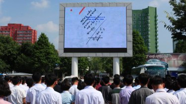 The hand that signed the paper: North Korean leader Kim Jong-un's signature is shown on the order authorising the launch. 