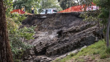 A huge landslide blocked Warrigal Road completely in the wake of the storm.