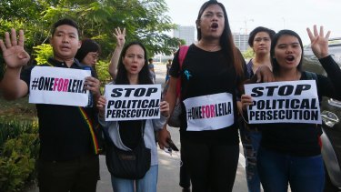 Leila de Lima supporters outside the Philippine Senate where the senator was arrested.