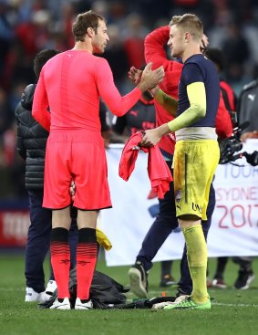 Redmayne is congratulated by Arsenal goalie Petr Cech after the friendly.