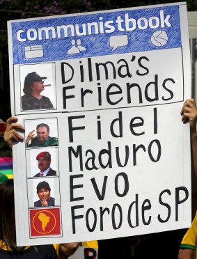 A demonstrator takes issue with Dilma Rousseff's friendly ties with left-wing Latin American governments.   