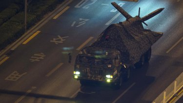 A Chinese military truck carries what appears to be a drone. Experts say Pakistan's drone program is closely linked to China's.