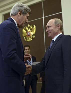 Russian President Vladimir Putin with US Secretary of State John Kerry in Sochi on May 12. The two countries discussed Syria but are unlikely to reach an agreement on its future.
