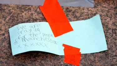 A handwritten note before a vigil in Albert Square, Manchester on Tuesday.