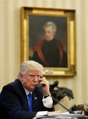 Donald Trump in the Oval Office, near a portrait of Andrew Jackson, a president with some similar traits.