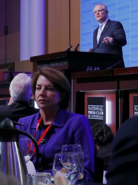 Anna Bligh listens as Treasurer Scott Morrison delivers his post-Budget address in the Great Hall at Parliament House.