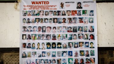A poster of wanted terrorists in the Marawi area.  
