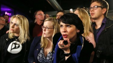 Birgitta (front) and fellow Pirate Party activists watch the results come in on election day in Reykjavik, October 2016.